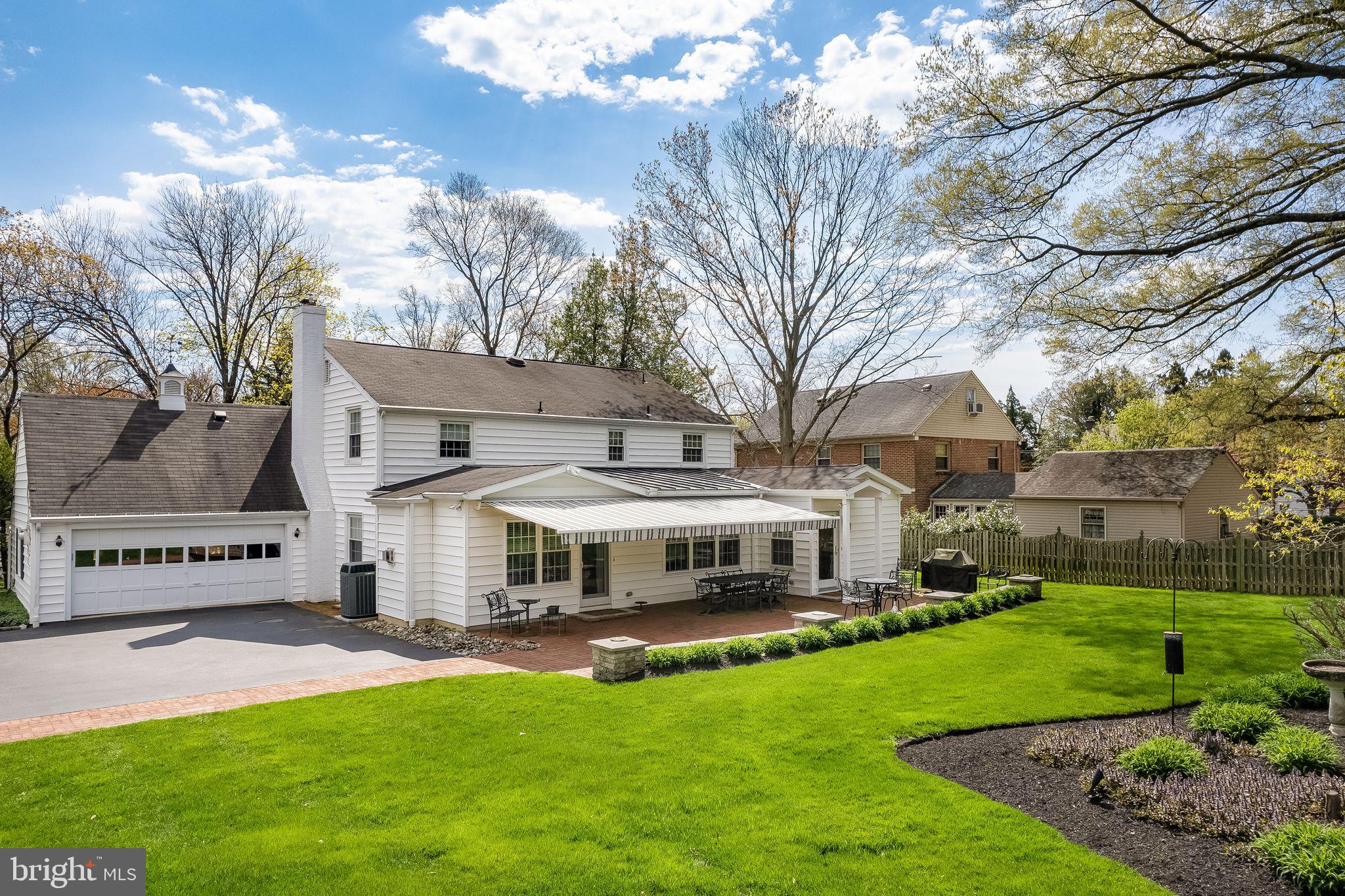 624 Warwick Road Haddonfield, NJ 08033 - Photo 39 of 43 a front view of a house with a garden and trees
