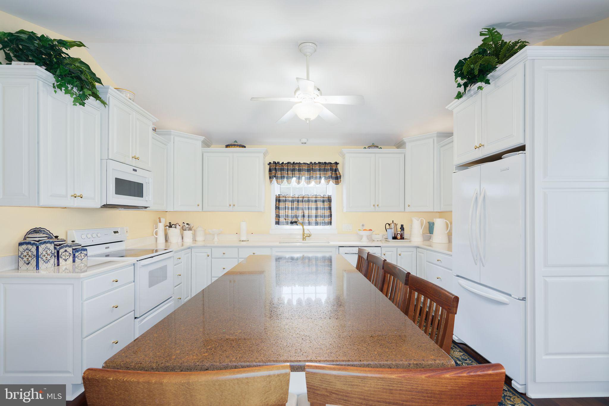 624 Warwick Road Haddonfield, NJ 08033 - Photo 8 of 43 a large white kitchen with cabinets