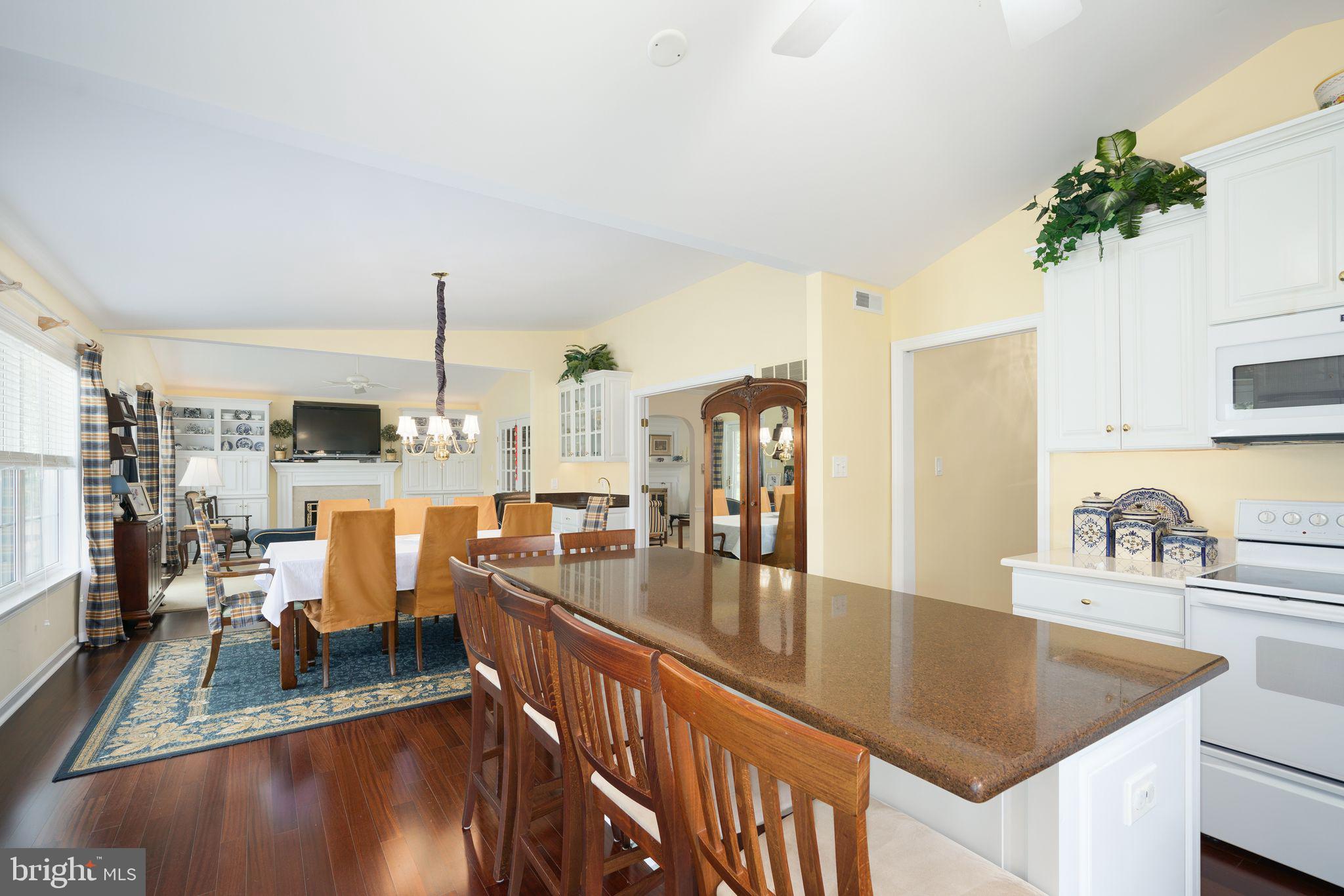 624 Warwick Road Haddonfield, NJ 08033 - Photo 10 of 43 a kitchen with stainless steel appliances granite countertop a sink a stove and a wooden floors