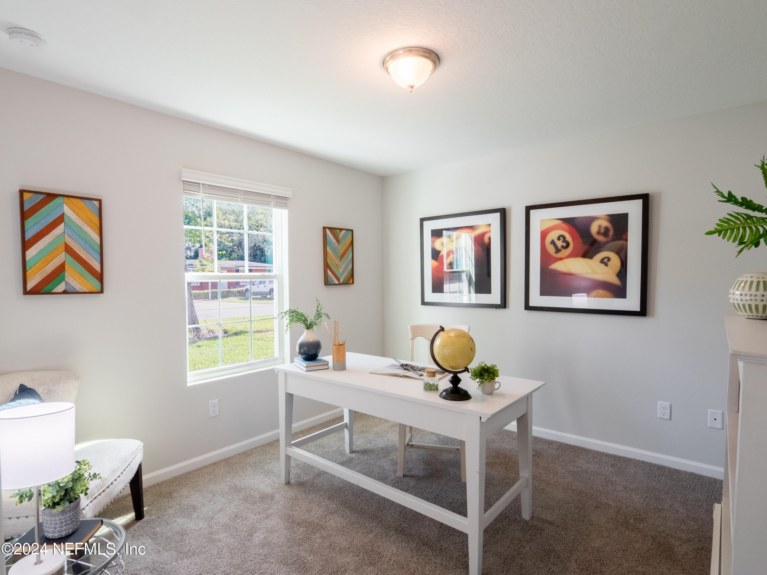 4011 Spring Glen Road Jacksonville, FL 32207 - Photo 3 of 38 a room with a table chair and a window