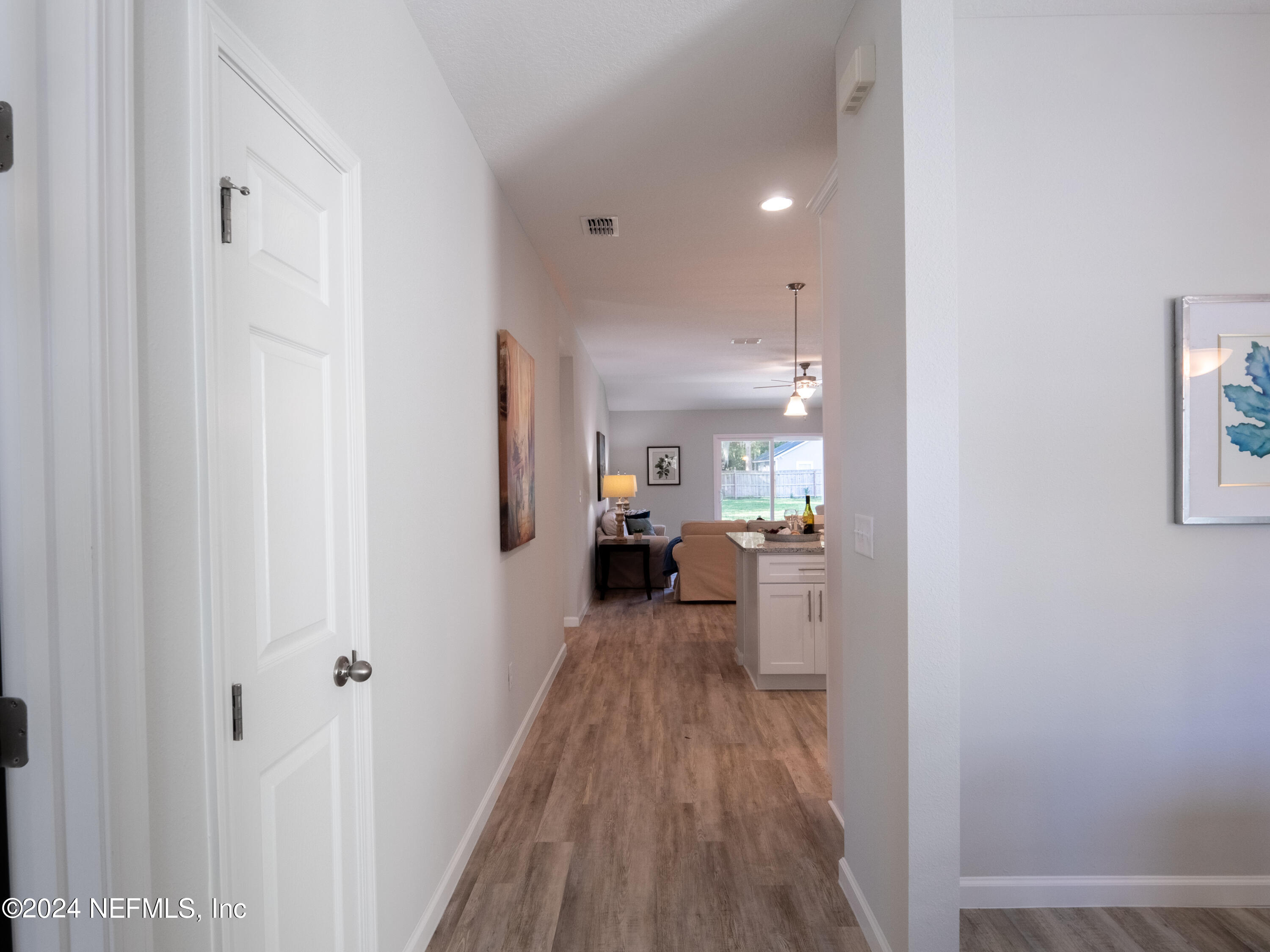 4011 Spring Glen Road Jacksonville, FL 32207 - Photo 8 of 38 a view of a living room with wooden floor