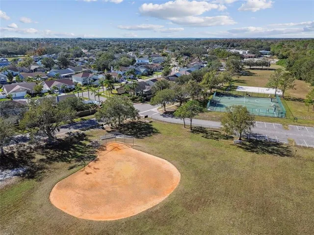 swimming pool with an outdoor space and seating area