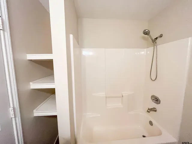 a bathroom with a bathtub