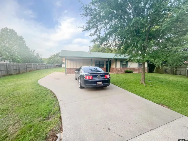 a car parked in the middle of a park