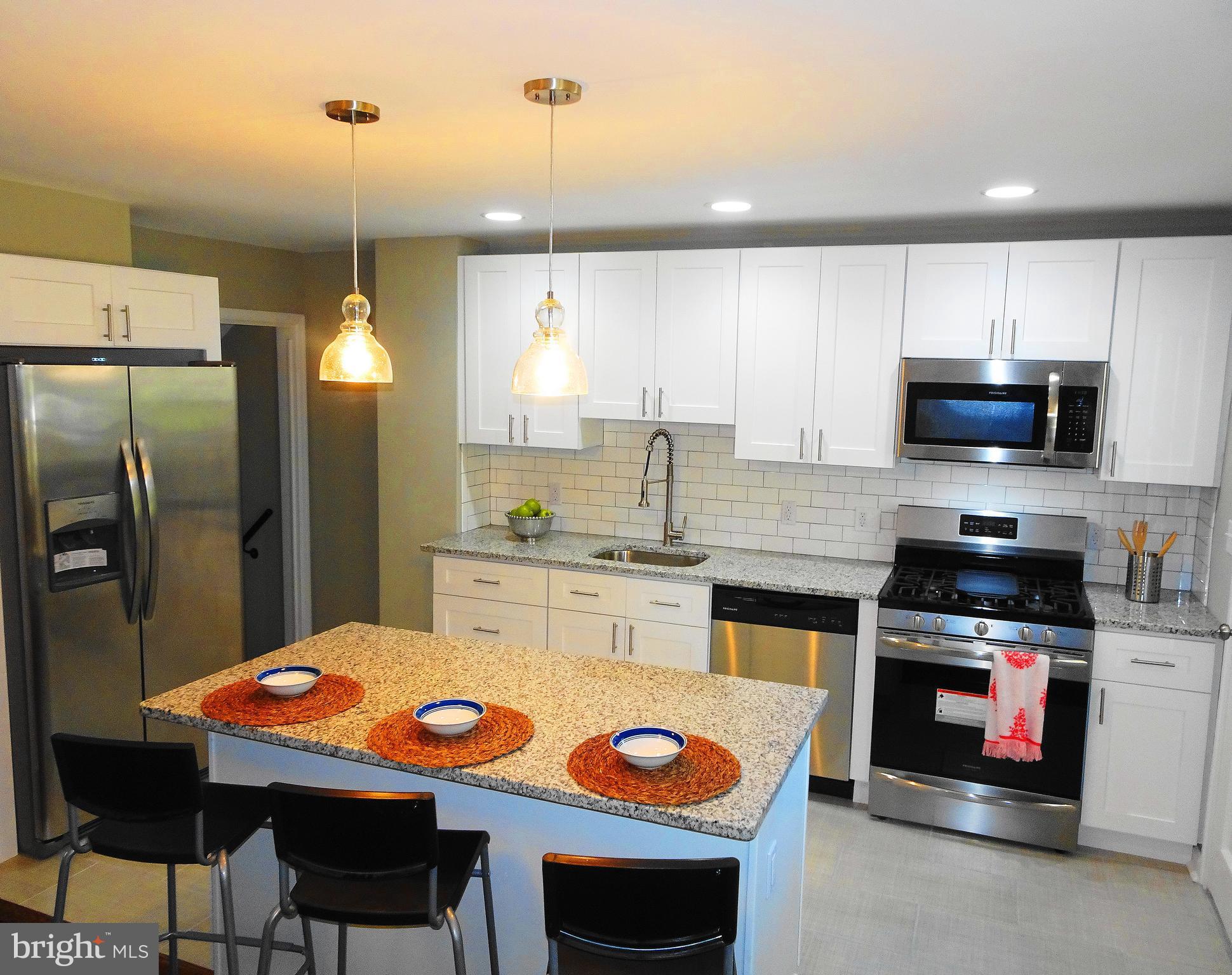 1732 Hartsdale Road Baltimore, MD 21239 - Photo 2 of 30 island b-bar seating for 3, 36" wood cabinets