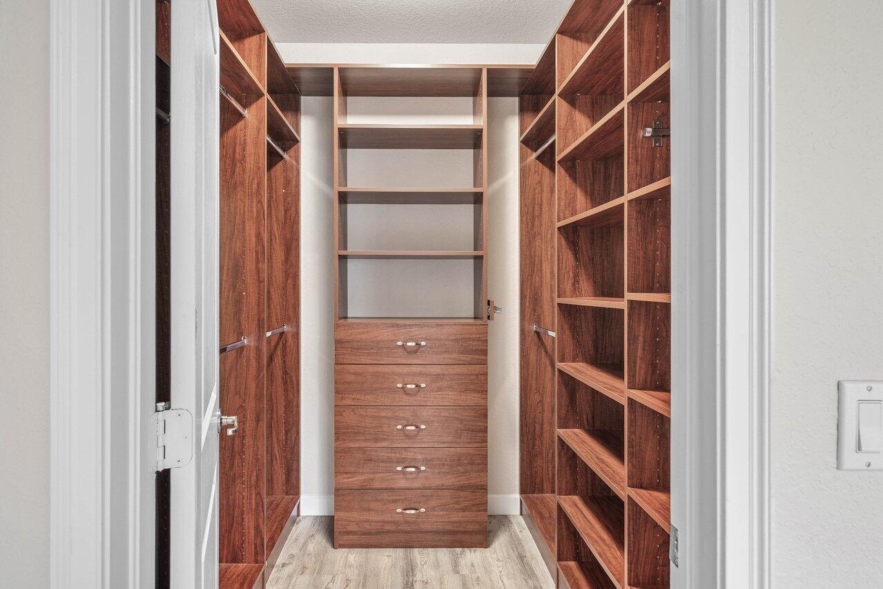 48 Northwest Hawthorne Place Boca Raton, FL 33432 - Photo 21 of 35 Custom Walk-In Closet