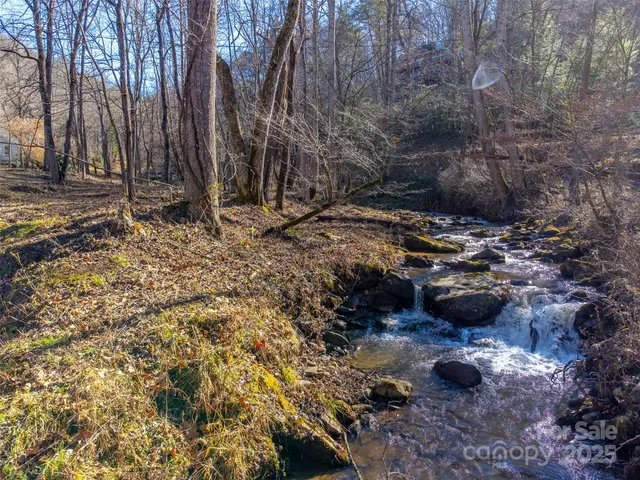 a view of a backyard of the house