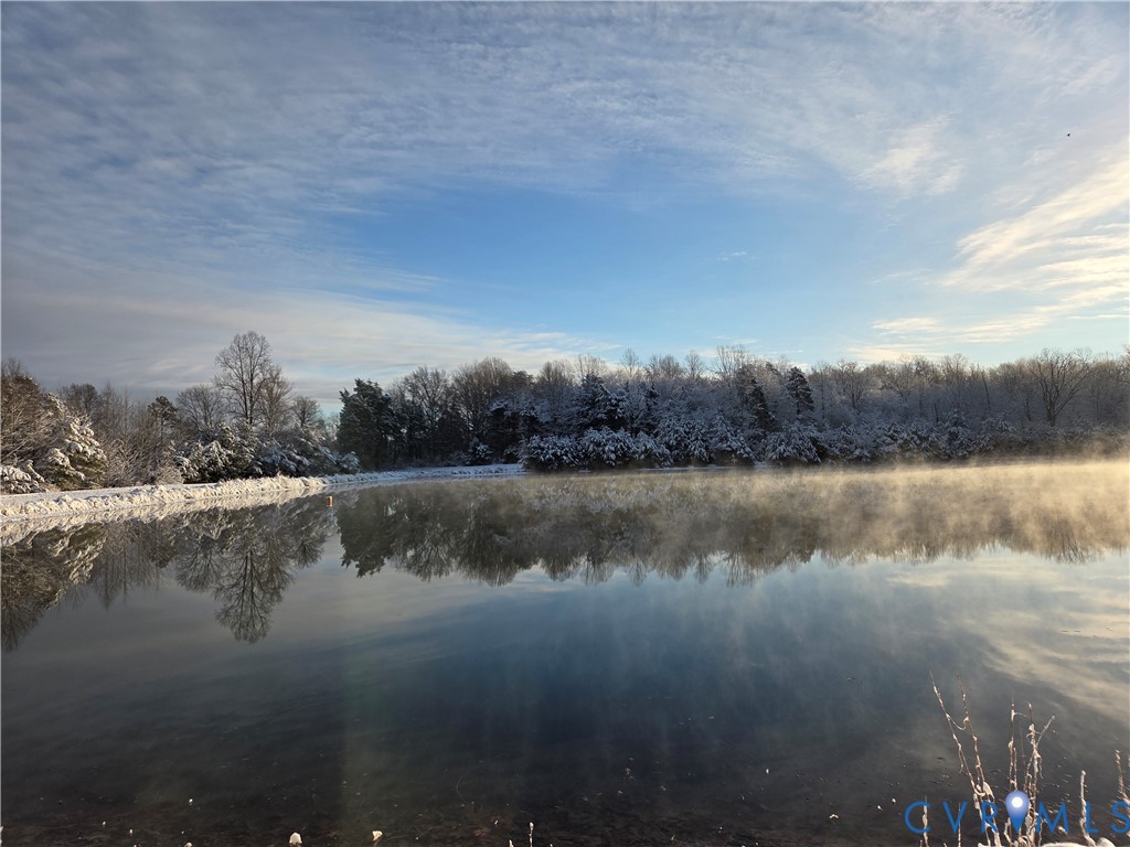 239 Jennings Road Cartersville, VA 23027 - Photo 24 of 26 Serene body of water reflecting a snow-covered tre