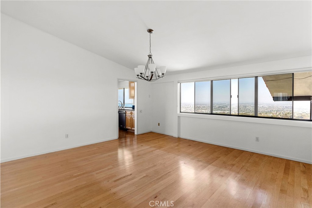 972 Via Rincon Palos Verdes Estates, CA 90274 - Photo 13 of 37 wooden floor in an empty room with a window