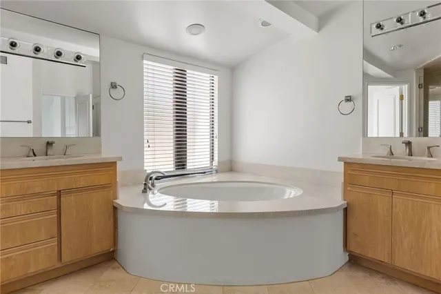 a view of an empty room with windows