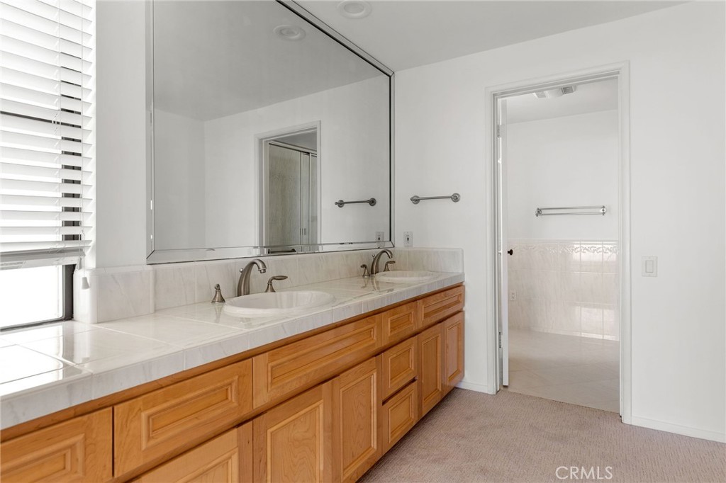 972 Via Rincon Palos Verdes Estates, CA 90274 - Photo 35 of 37 a bathroom with double sink and a mirror