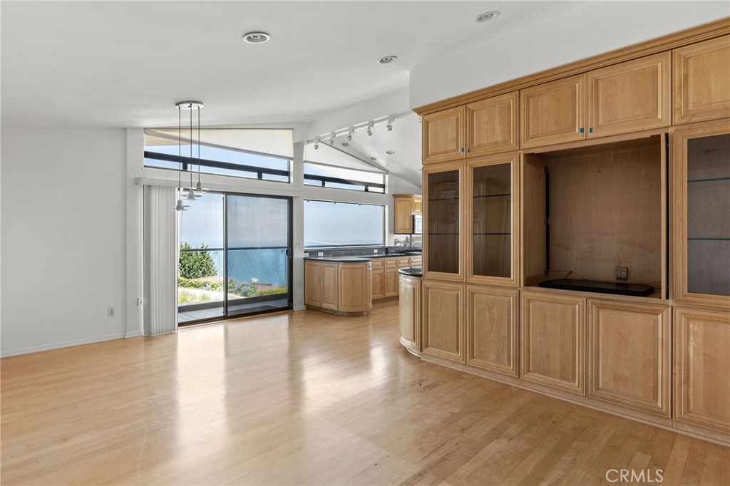 972 Via Rincon Palos Verdes Estates, CA 90274 - Photo 9 of 37 a view of a kitchen with wooden cabinet and a refrigerator
