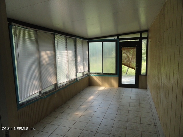 5103 Damascus Road North Jacksonville, FL 32207 - Photo 8 of 9 Enclosed Porch