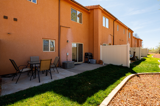 6 300th Road North, Unit I6 Kanab, UT 84741 - Photo 30 of 37 Back of property with stucco siding and a patio area