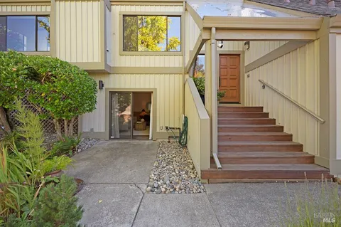 a view of entryway with a front door