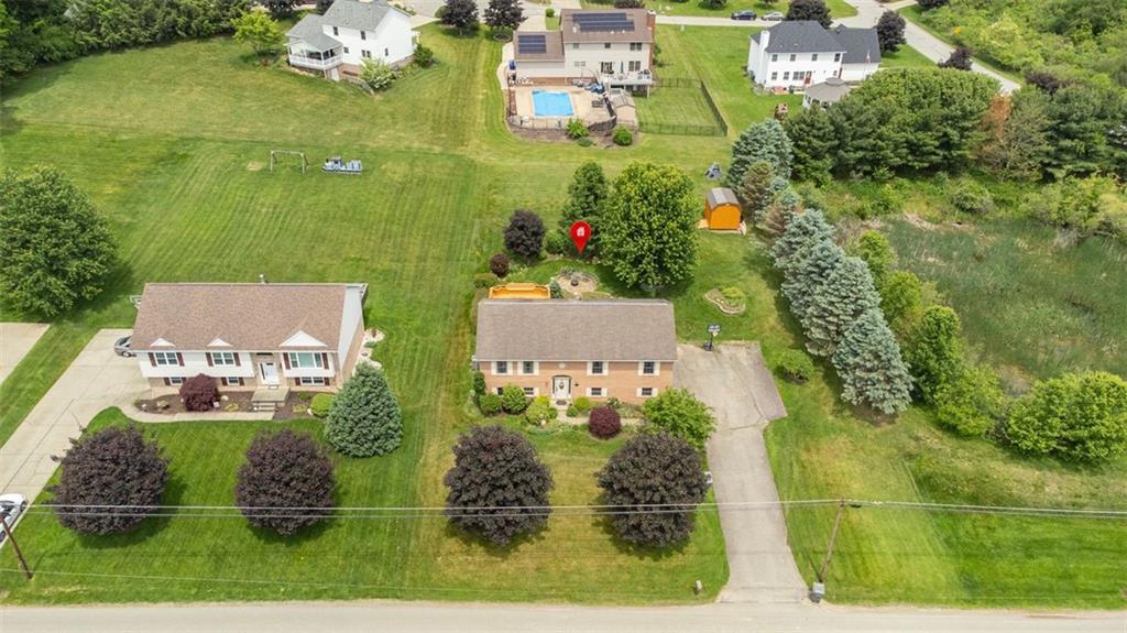 152 Cupps Road Renfrew, PA 16053 - Photo 38 of 43 an aerial view of a house with a yard basket ball court and outdoor seating