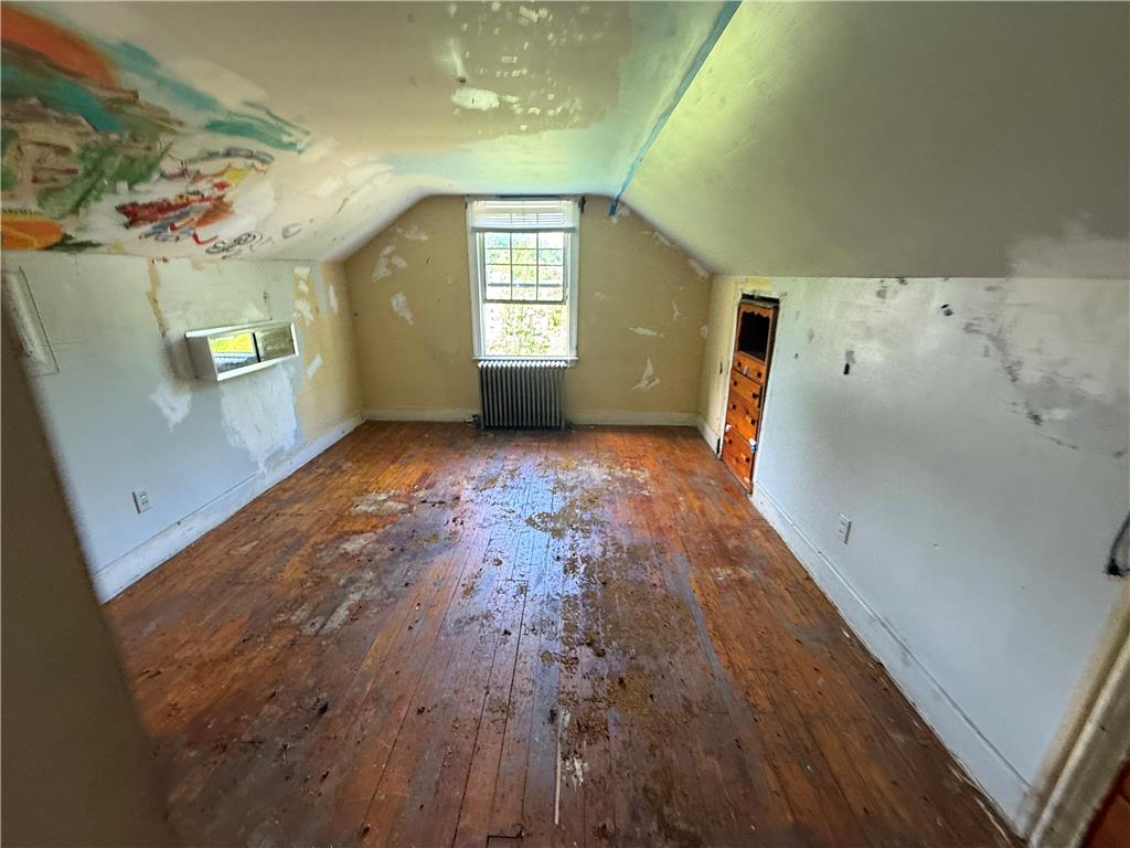 3051 Keystone Street Bethlehem, PA 18020 - Photo 16 of 18 A promising attic space with exposed hardwood floors awaits creative transformation into a personalized sanctuary.