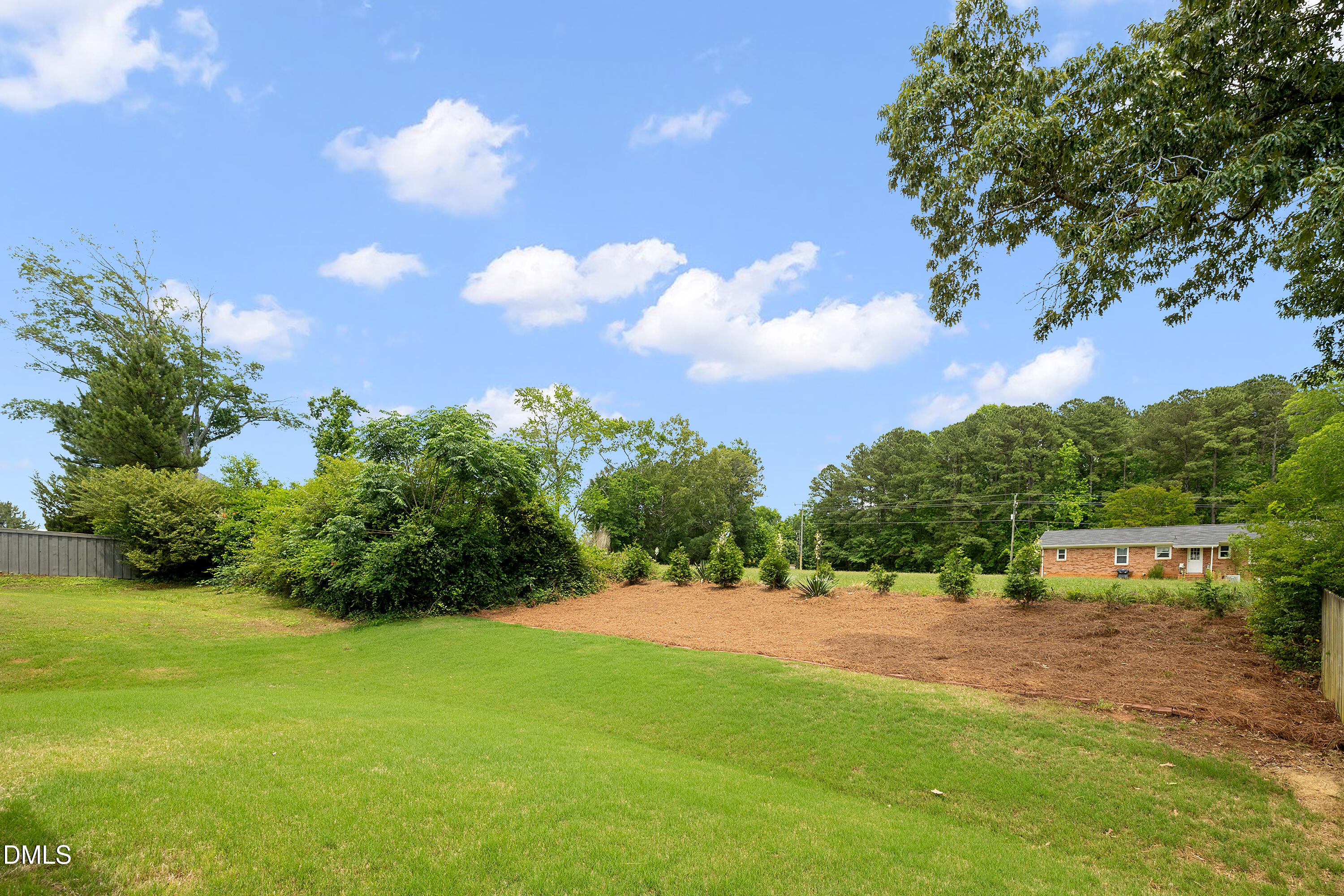 8059 Gilano Drive Raleigh, NC 27603 - Photo 40 of 43 a view of an outdoor space and yard