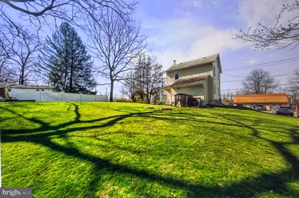 a view of a house with a big yard
