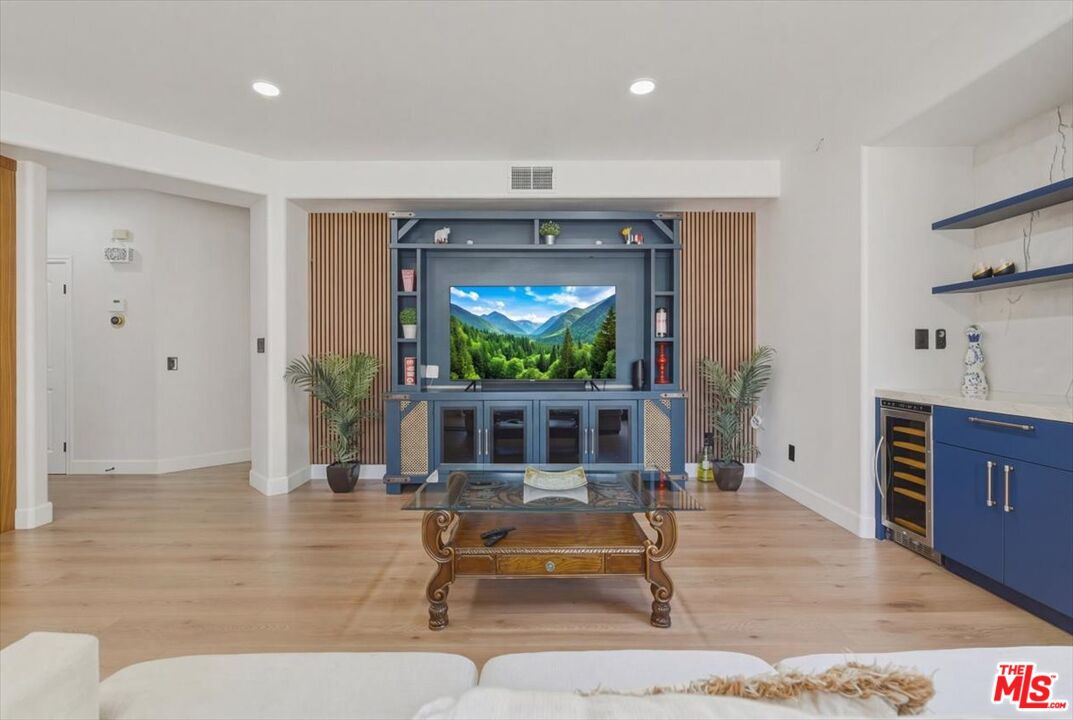 3891 Marks Road Agoura Hills, CA 91301 - Photo 20 of 52 a living room with furniture and a large window