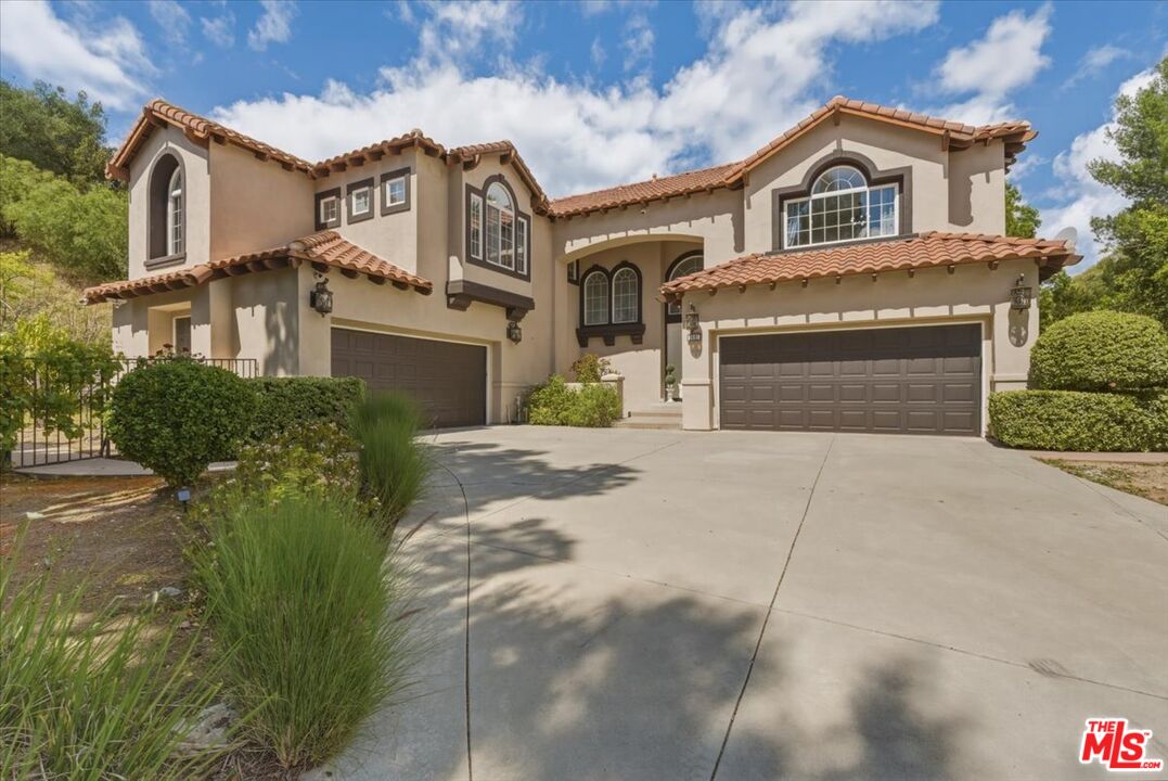 3891 Marks Road Agoura Hills, CA 91301 - Photo 2 of 52 front view of house with a yard