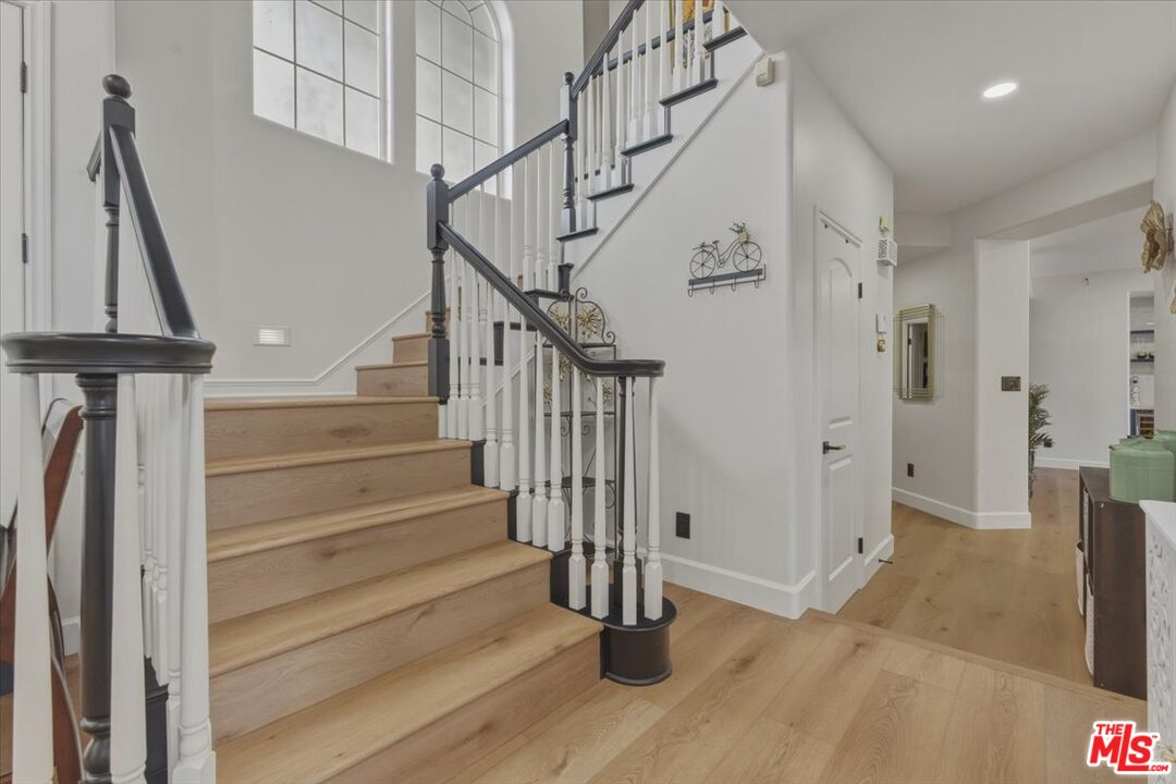 3891 Marks Road Agoura Hills, CA 91301 - Photo 26 of 52 a view of entryway with wooden floor and stairs