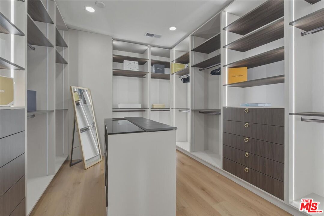 3891 Marks Road Agoura Hills, CA 91301 - Photo 30 of 52 a view of walk in closet with empty racks