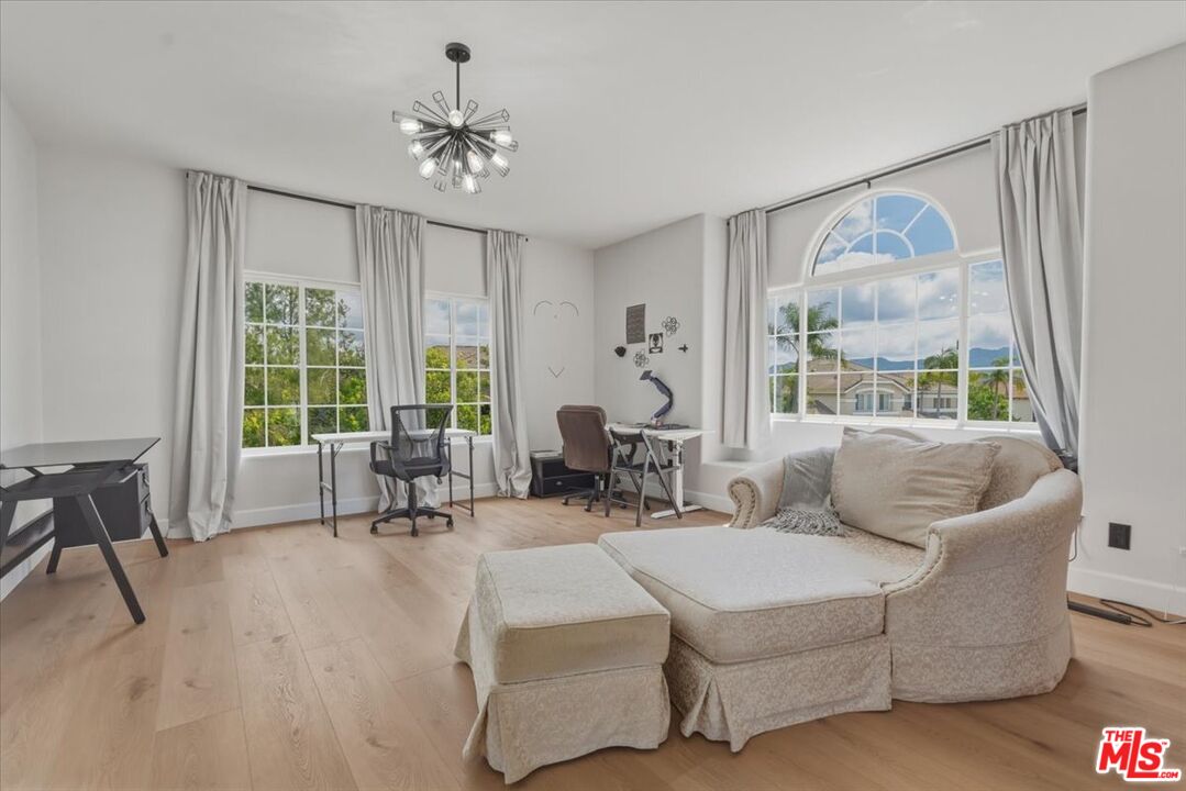 3891 Marks Road Agoura Hills, CA 91301 - Photo 44 of 52 a living room with furniture and a large window