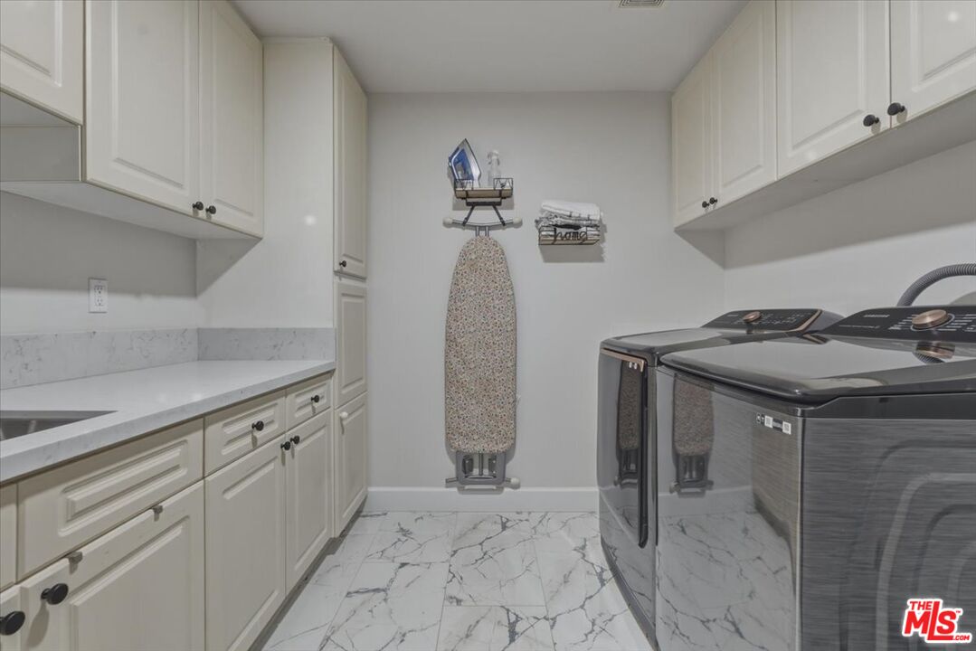 3891 Marks Road Agoura Hills, CA 91301 - Photo 46 of 52 a utility room with sink dryer and washer