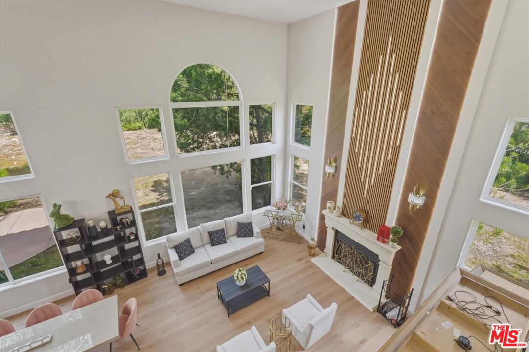 3891 Marks Road Agoura Hills, CA 91301 - Photo 5 of 52 a living room with furniture and a window