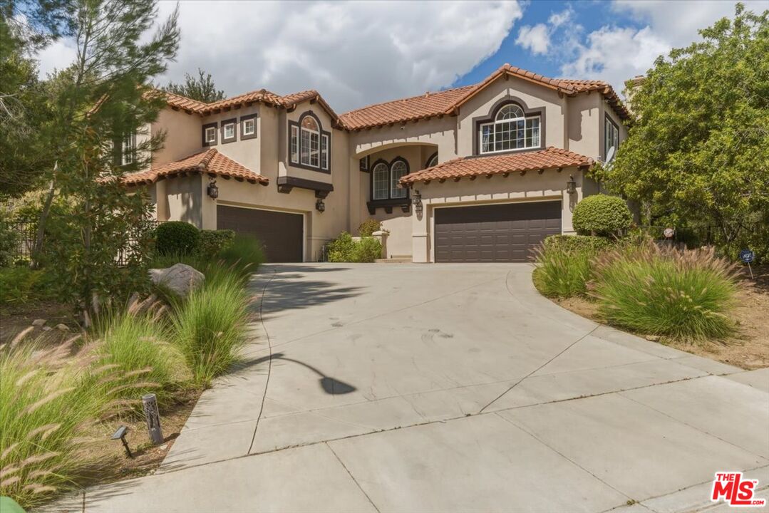 3891 Marks Road Agoura Hills, CA 91301 - Photo 52 of 52 a front view of a house with a yard