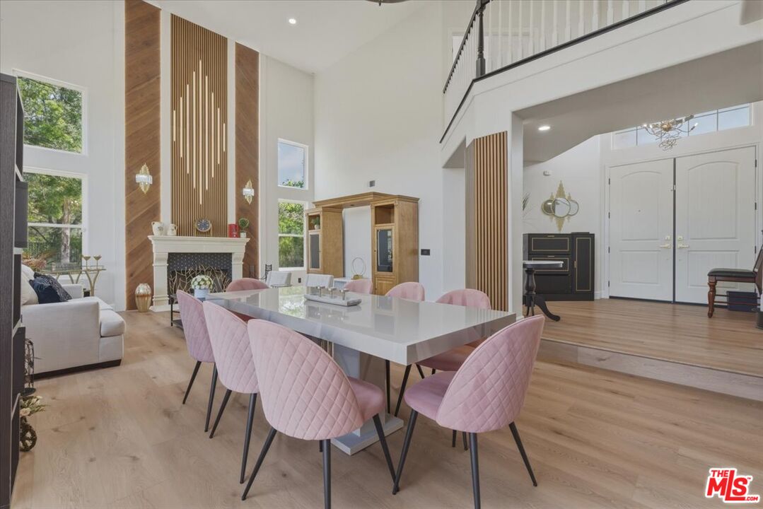 3891 Marks Road Agoura Hills, CA 91301 - Photo 10 of 52 a view of a dining room with furniture window and wooden floor