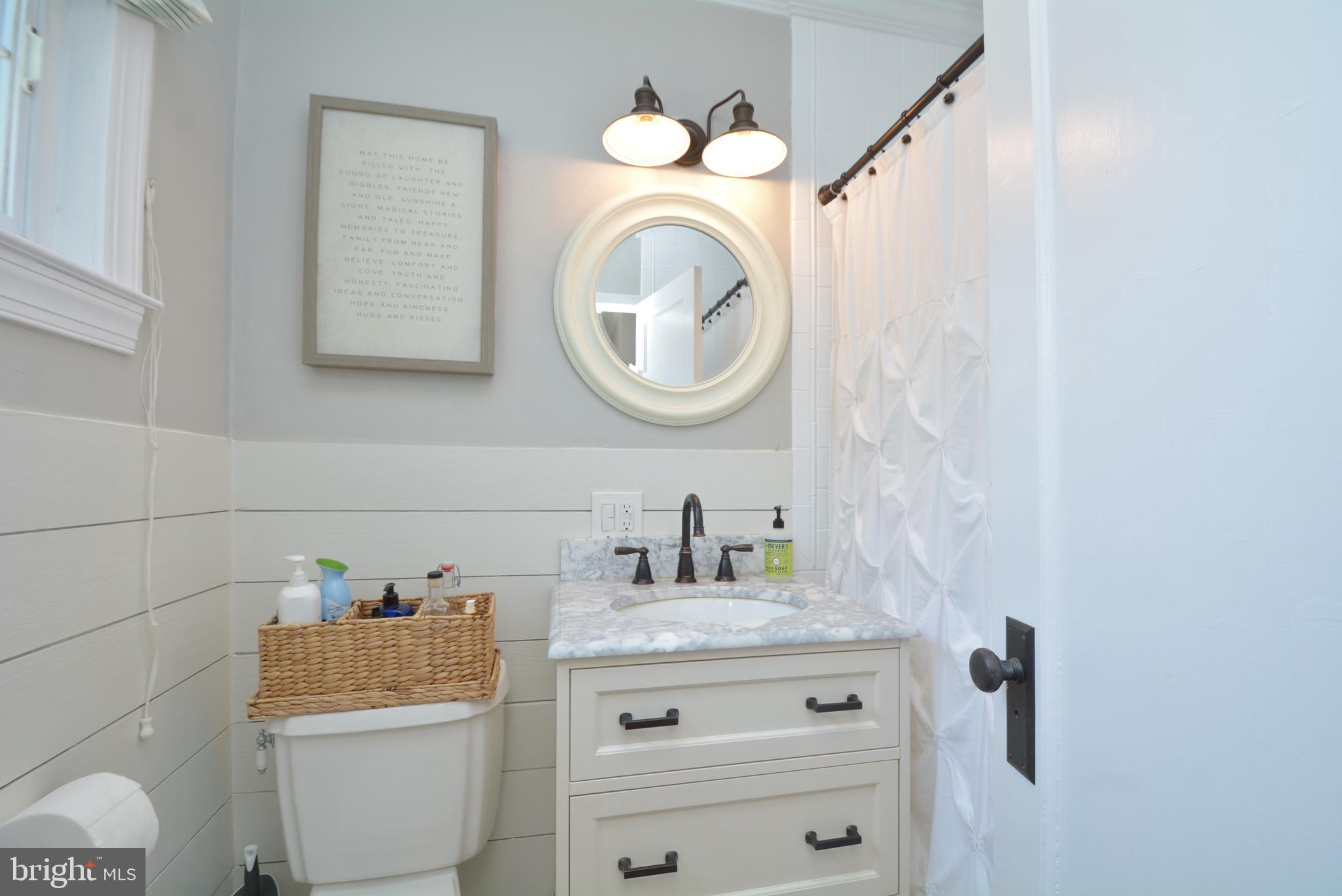 1635 Ripon Place Alexandria, VA 22302 - Photo 25 of 37 Renovated bathroom -- look at that shiplap!