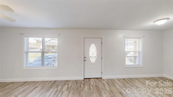 an empty room with windows