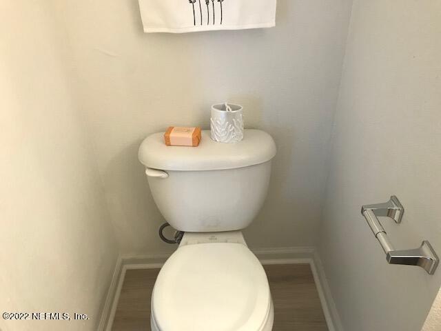 426 Dutton Island Road West Jacksonville, FL 32233 - Photo 11 of 22 a bathroom with a toilet and a sink
