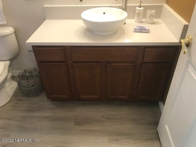 426 Dutton Island Road West Jacksonville, FL 32233 - Photo 17 of 22 a bathroom with a sink and a mirror