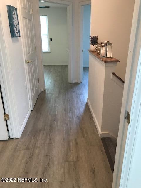 426 Dutton Island Road West Jacksonville, FL 32233 - Photo 22 of 22 a view of a storage & utility room in wooden floor