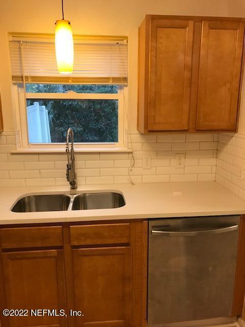 426 Dutton Island Road West Jacksonville, FL 32233 - Photo 6 of 22 a bathroom with a sink and a mirror