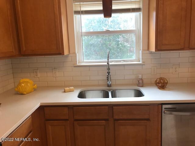 426 Dutton Island Road West Jacksonville, FL 32233 - Photo 7 of 22 a kitchen with a sink and a window