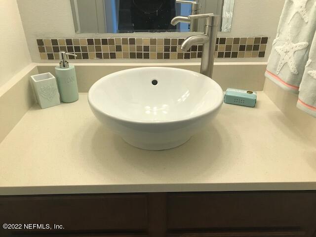 426 Dutton Island Road West Jacksonville, FL 32233 - Photo 10 of 22 a view of spacious bathroom with a sink and mirror