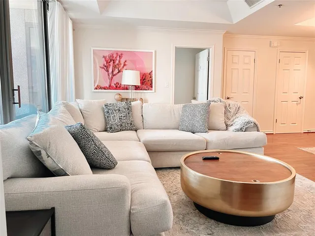 a living room with furniture and a couch