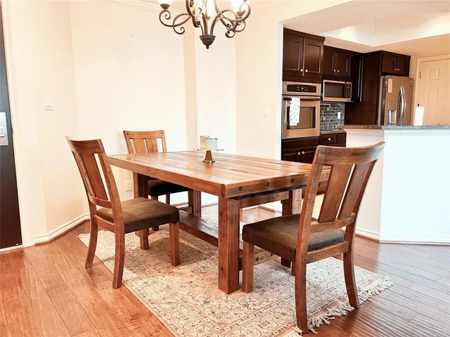 a view of a dining room with furniture