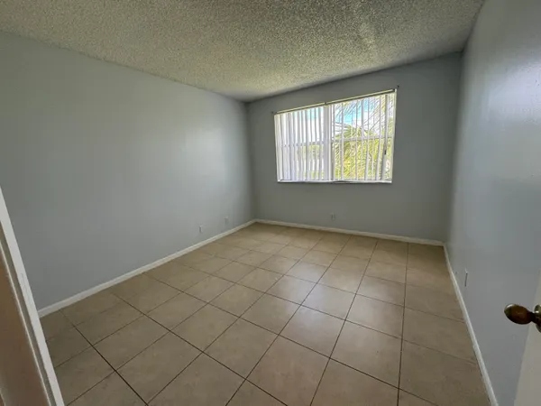$2,000 | 8891 Wiles Road, Unit 303, Coral Springs, FL 33067