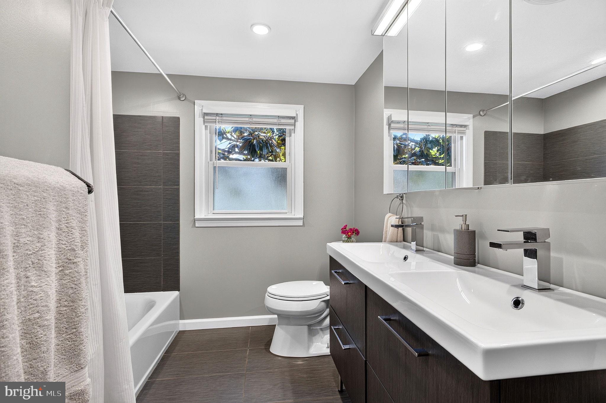 321 Buttonwood Street Hamilton, NJ 08619 - Photo 26 of 42 Updated Main Bath with stylish double sinks