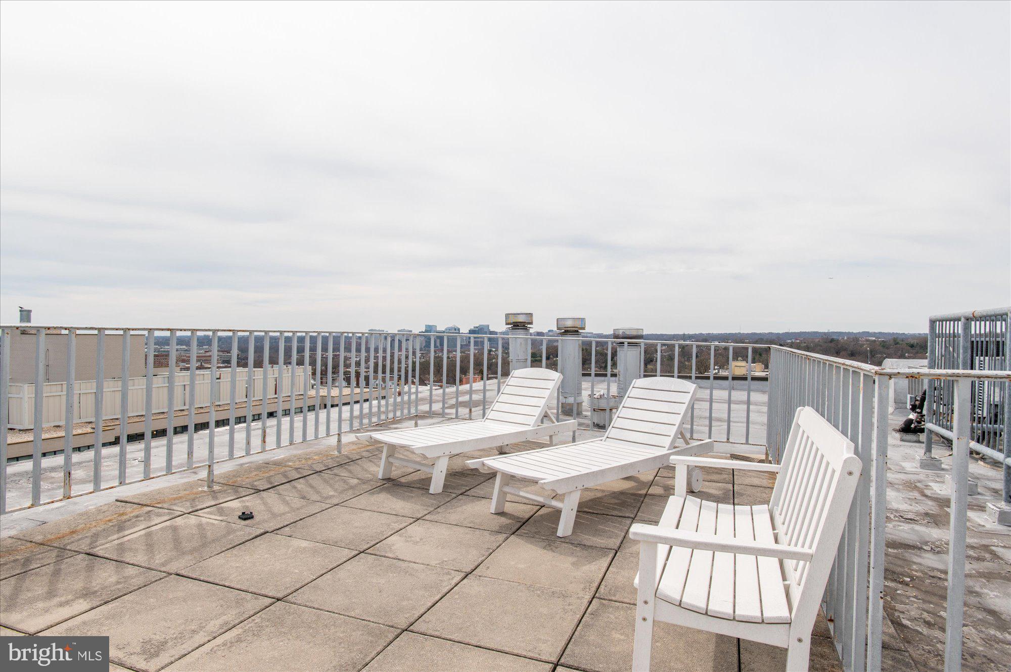 2127 California Street Northwest, Unit 803 Washington, DC 20008 - Photo 20 of 22 a view of a terrace with chairs