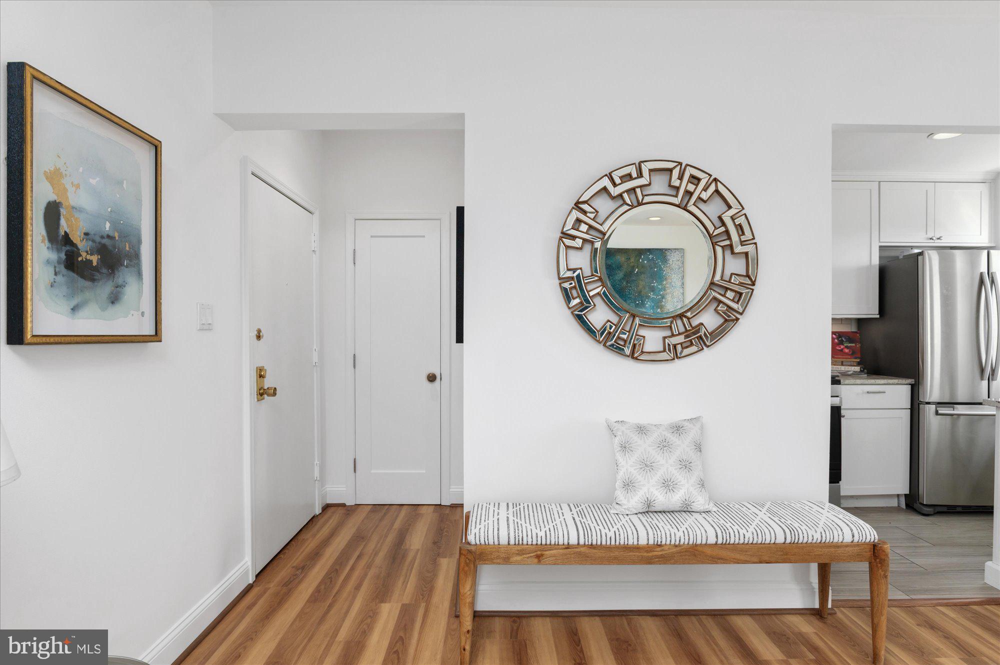 2127 California Street Northwest, Unit 803 Washington, DC 20008 - Photo 4 of 22 a view of livingroom with furniture and wooden floor
