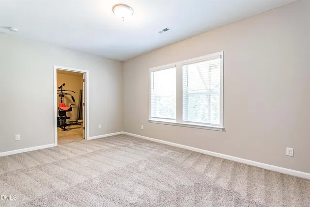 an empty room with window