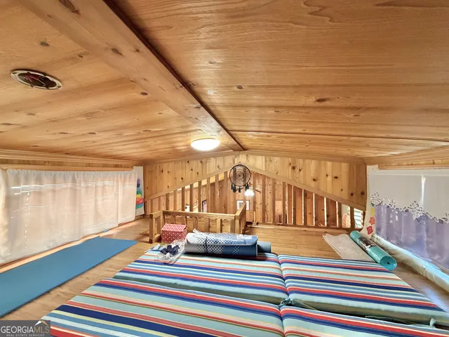 a view of empty room with stairs