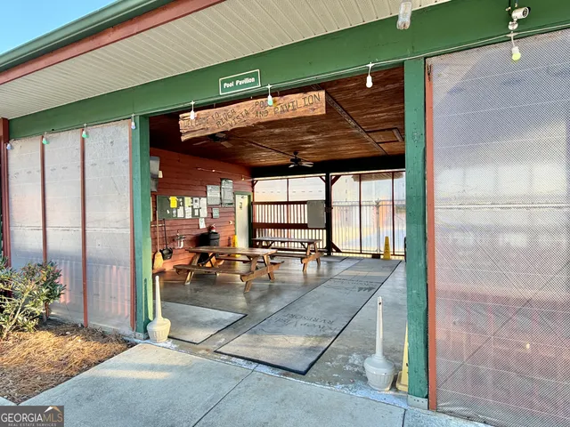 a view of a porch with furniture
