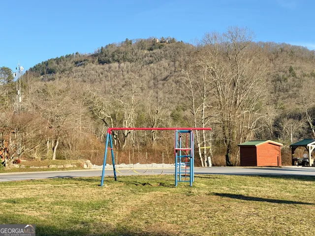 a view of a lake with a mountain in the background